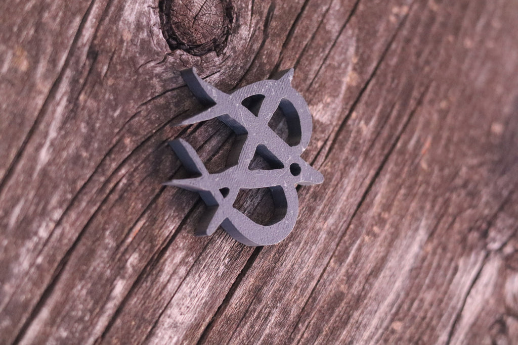 Revolt Unmanage style keychain