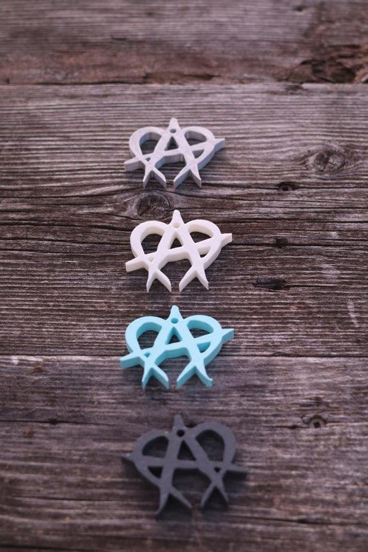 Revolt Unmanageable style keychain