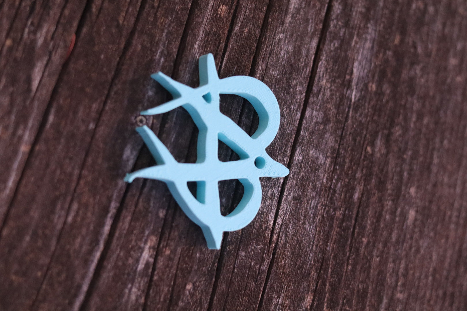 Revolt Unmanage style keychain