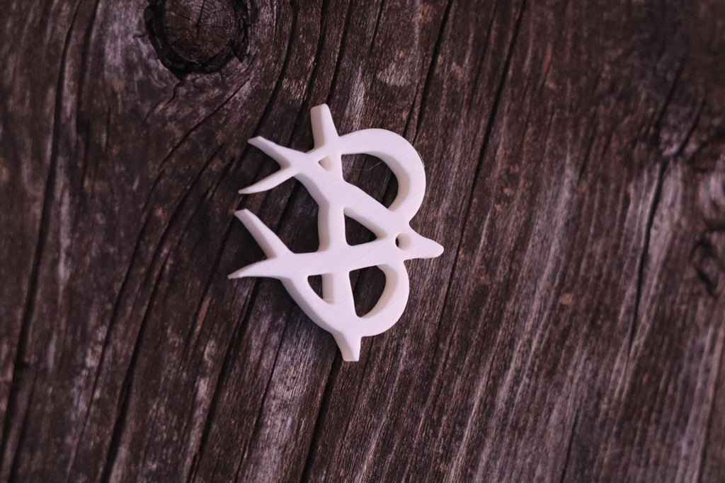 Revolt Unmanage style keychain